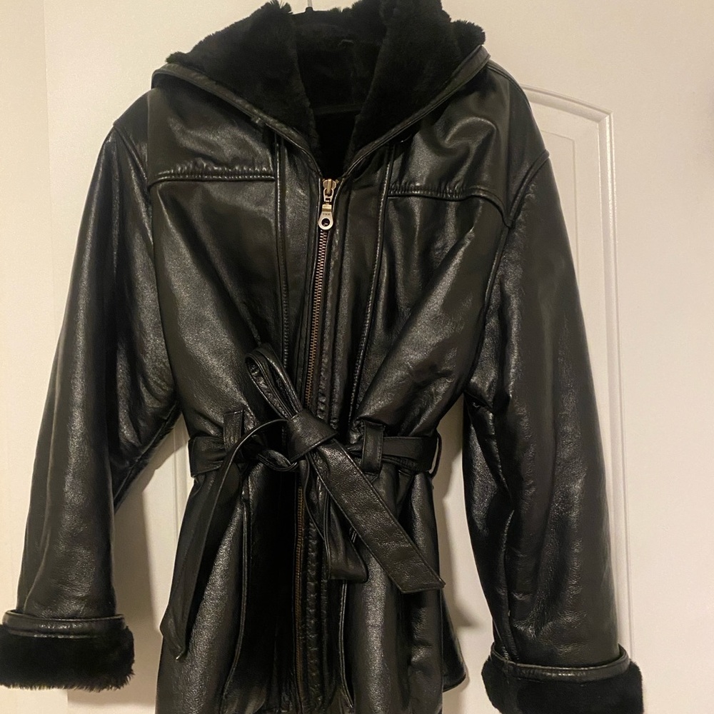 90s style Wilson’s leather jacket with hood and cinched tie waist.